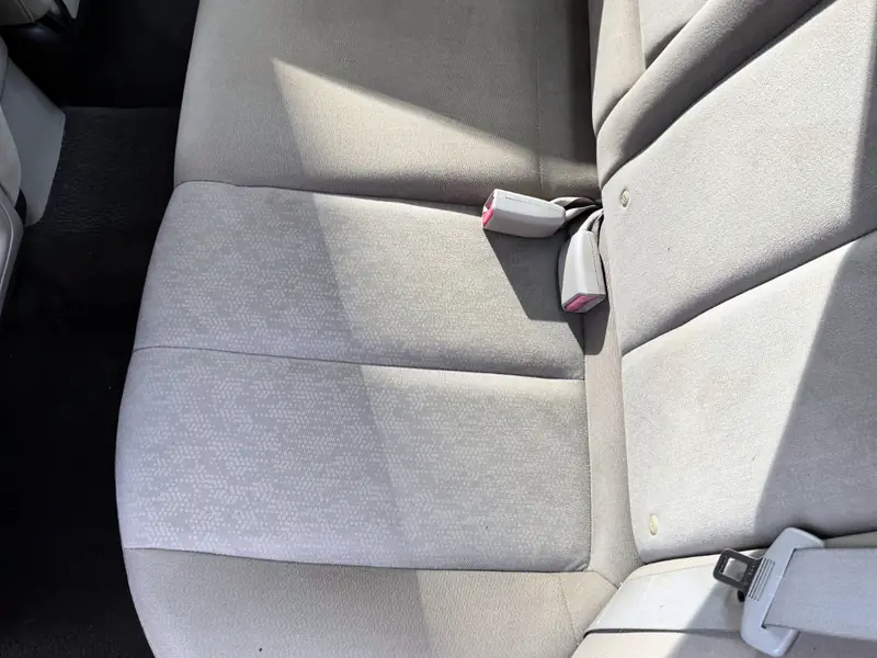 Rear sedan car seat professionally cleaned and conditioned